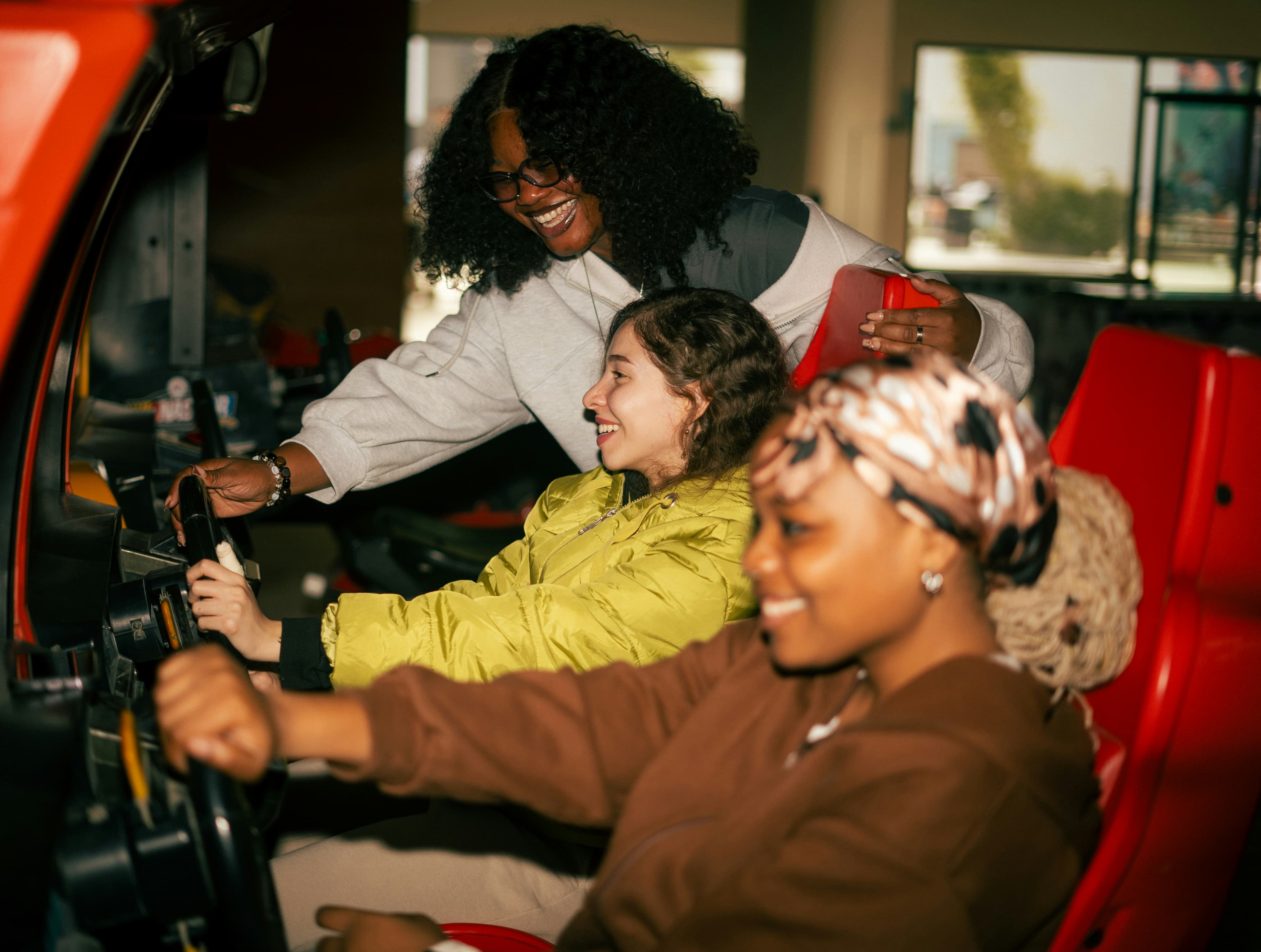 Kids racing on arcade machines